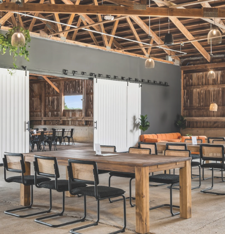 Interior of the Cider Nook at The Taphouse, a cozy semi-private space with seating for small groups